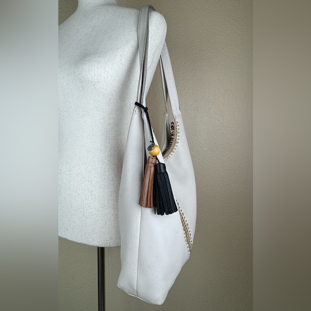 The Sak Huntley Hobo Bag. Ecru.Soft, Pebbled Leather w/Fabric Turquoise Interior - Picture 9 of 16